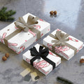 Festive Christmas Holiday Wrapping Paper Roll — Pink Candy Cane Bows